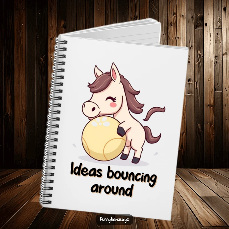Funny Horse Notebook showcasing an energetic horse playfully nudging a bouncing ball, ideal for humorous note-taking and playful ideas.